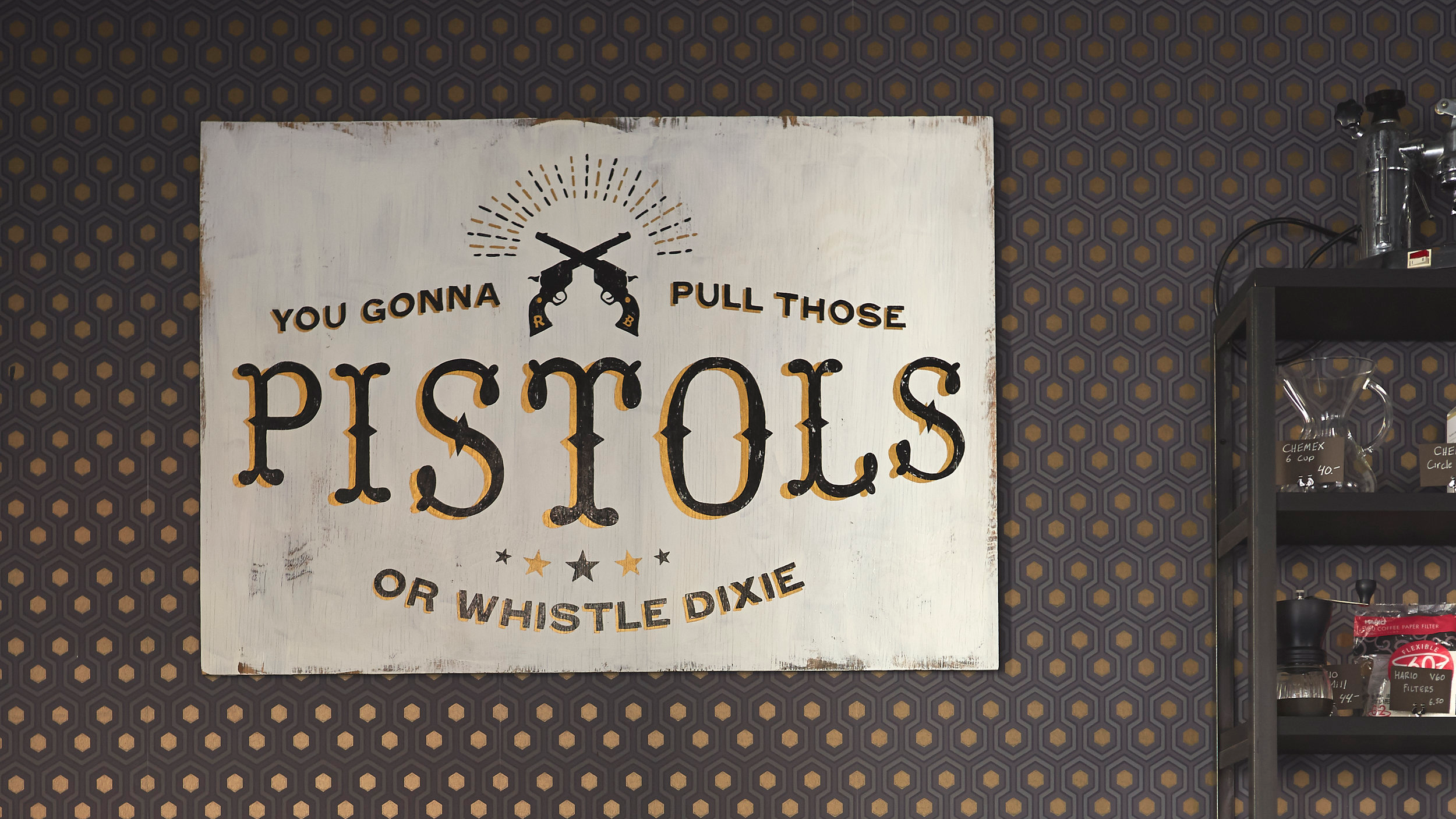'You gonna pull those Pistols or Whistle Dixie' banner