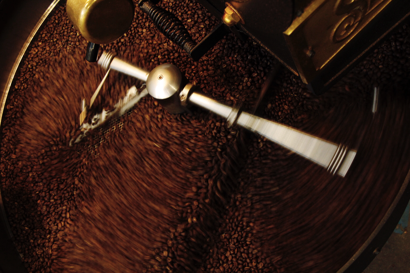 Coffee beans turning in the Rival Bros roaster